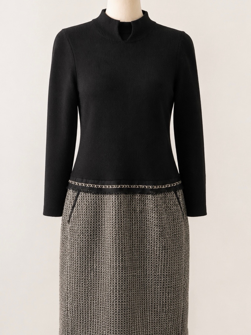Black ribbed w attached skirt and belt dress